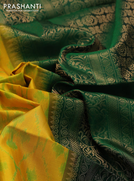 Ikat soft silk saree mustard yellow and dark green with allover ikat weaves & zari buttas in borderless style