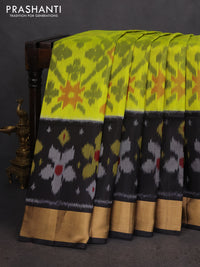 Ikat soft silk saree lime yellow and black with allover ikat weaves and zari woven border