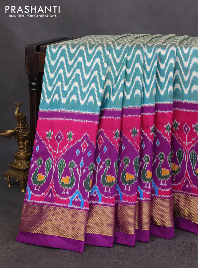 Pochampally silk saree teal green and violet with allover ikat prints and zari woven border