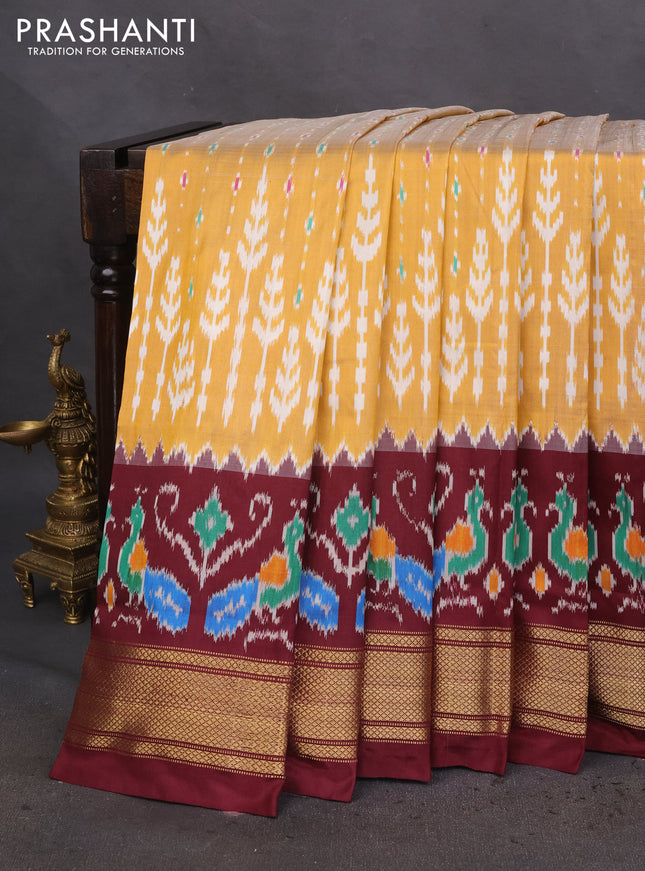 Pochampally silk saree pale yellow and wine shade with allover ikat prints and zari woven border