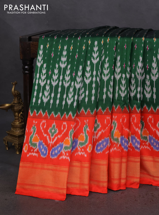Pochampally silk saree green and orange with allover ikat prints and zari woven border