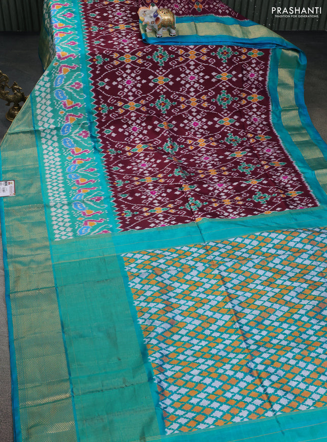 Pochampally silk saree deep wine and teal blue with allover ikat prints and long zari woven border