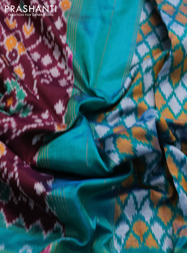Pochampally silk saree deep wine and teal blue with allover ikat prints and long zari woven border