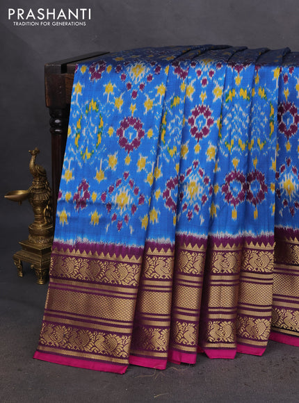 Pochampally silk saree cs blue and deep purple with allover ikat prints and annam zari woven border