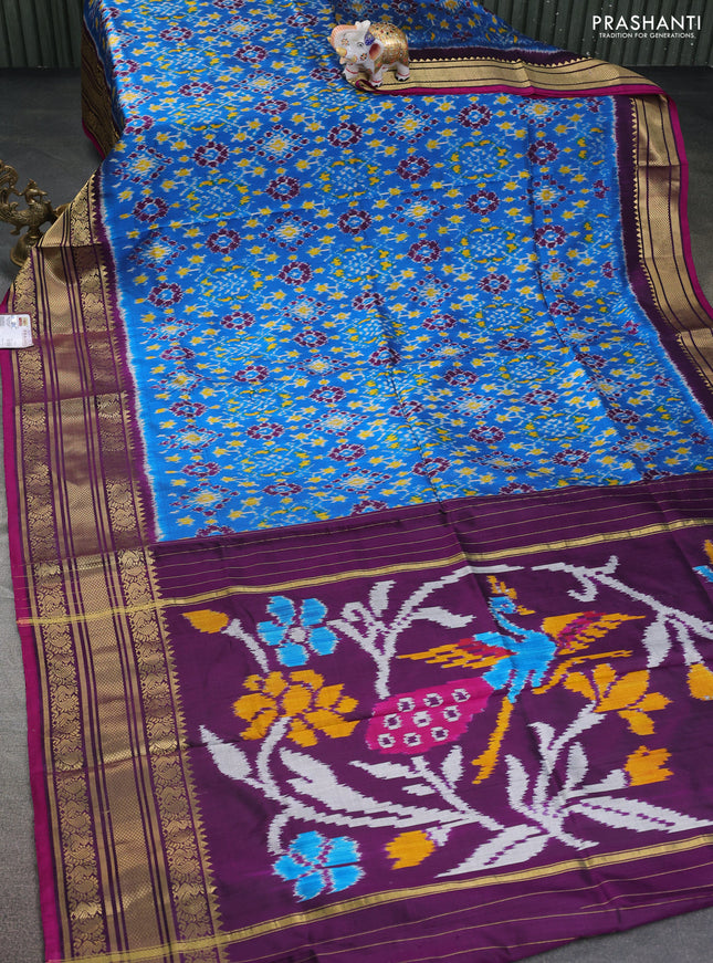 Pochampally silk saree cs blue and deep purple with allover ikat prints and annam zari woven border