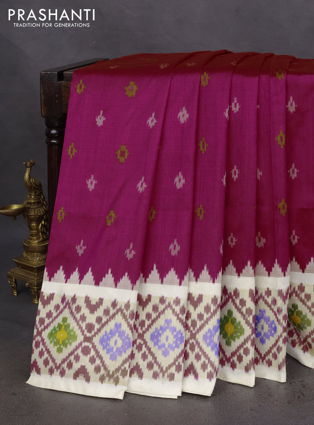 Pochampally silk saree dark magenta pink and cream with allover ikat butta weaves and zari woven ikat style border