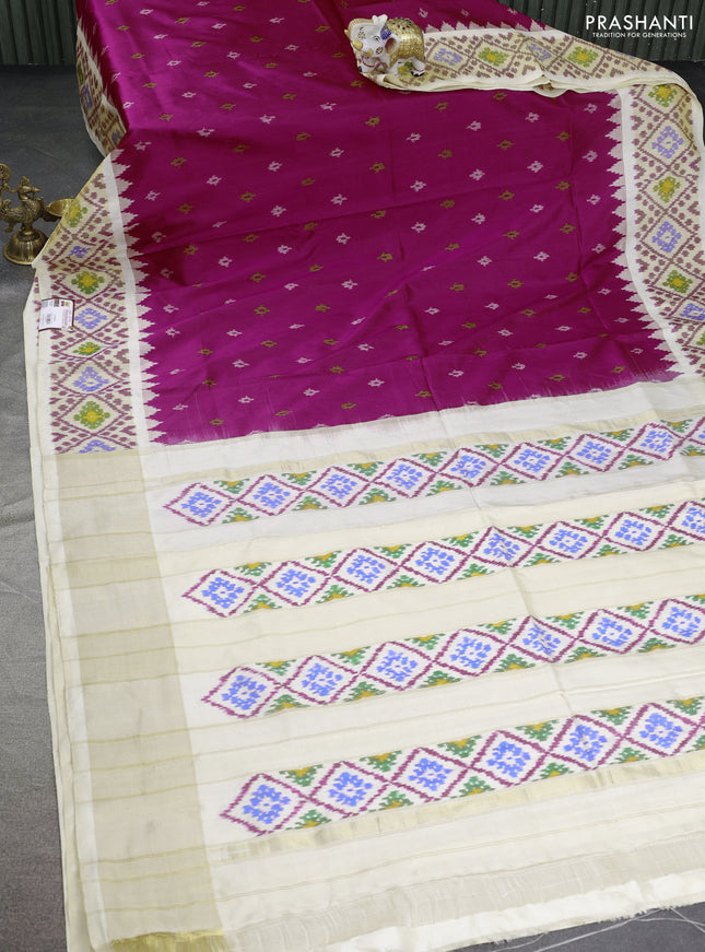 Pochampally silk saree dark magenta pink and cream with allover ikat butta weaves and zari woven ikat style border