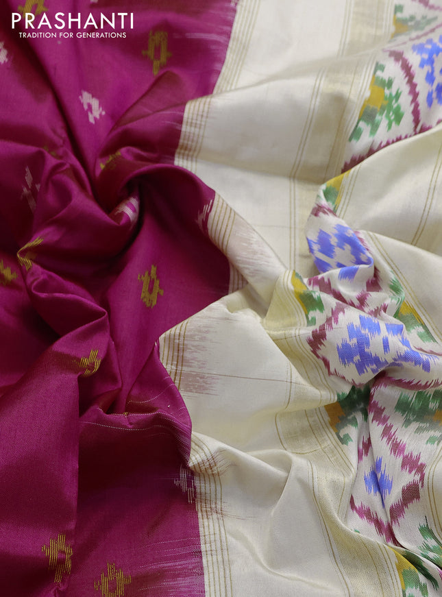 Pochampally silk saree dark magenta pink and cream with allover ikat butta weaves and zari woven ikat style border