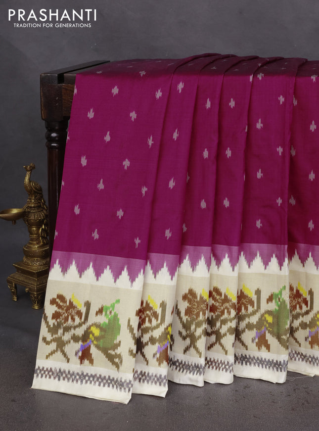 Pochampally silk saree magenta pink and cream with allover ikat butta weaves and zari woven ikat style border