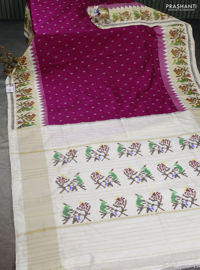 Pochampally silk saree magenta pink and cream with allover ikat butta weaves and zari woven ikat style border