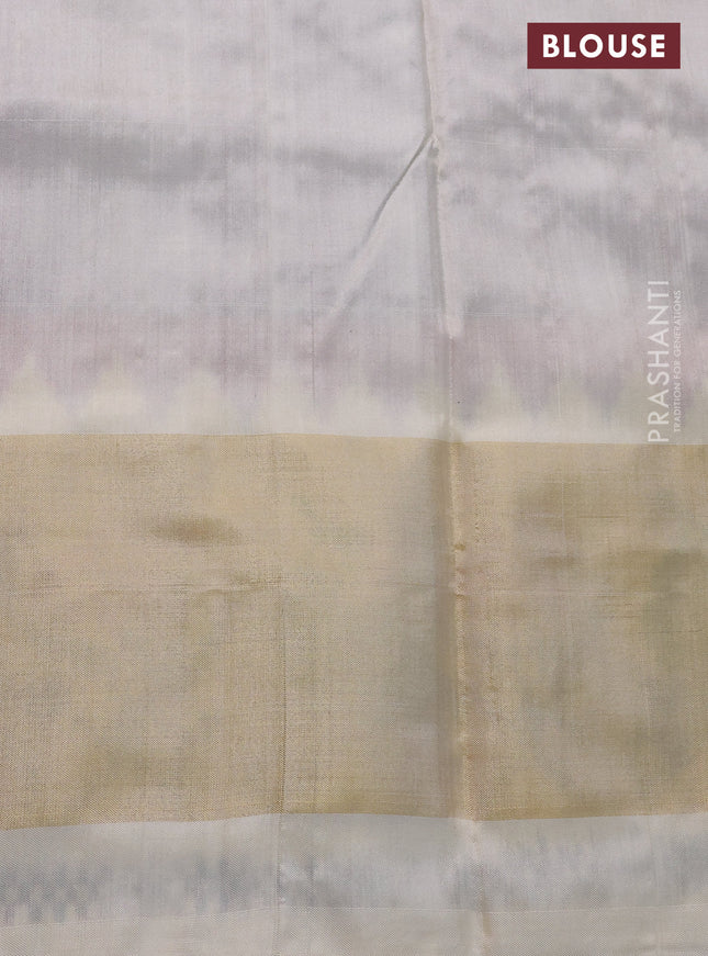 Pochampally silk saree magenta pink and cream with allover ikat butta weaves and zari woven ikat style border