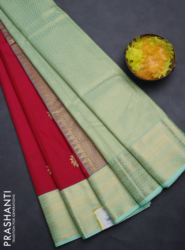 Semi kanchipuram silk saree pink and teal green with zari woven buttas and zari woven korvai border