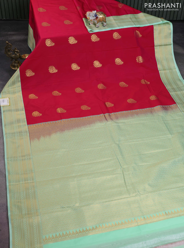 Semi kanchipuram silk saree pink and teal green with zari woven buttas and zari woven korvai border