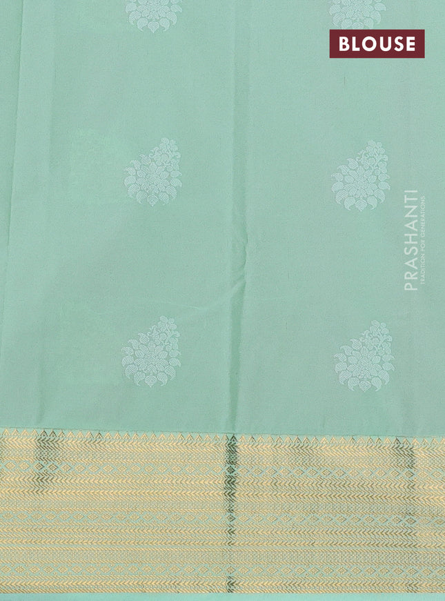 Semi kanchipuram silk saree pink and teal green with zari woven buttas and zari woven korvai border