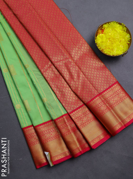 Semi kanchipuram silk saree light green and pink with allover zari weaves & buttas and zari woven korvai border