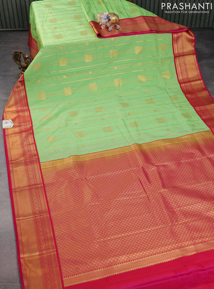 Semi kanchipuram silk saree light green and pink with allover zari weaves & buttas and zari woven korvai border
