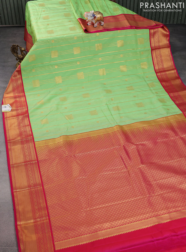 Semi kanchipuram silk saree light green and pink with allover zari weaves & buttas and zari woven korvai border