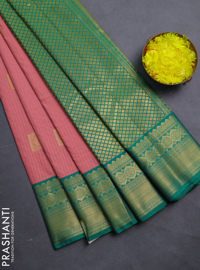 Semi kanchipuram silk saree peach pink and green with allover zari weaves & buttas and zari woven korvai border
