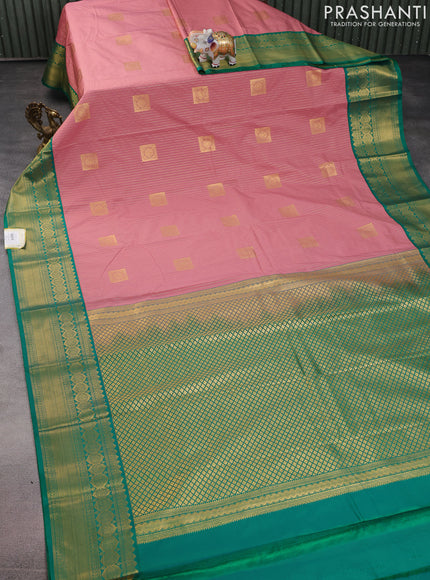 Semi kanchipuram silk saree peach pink and green with allover zari weaves & buttas and zari woven korvai border