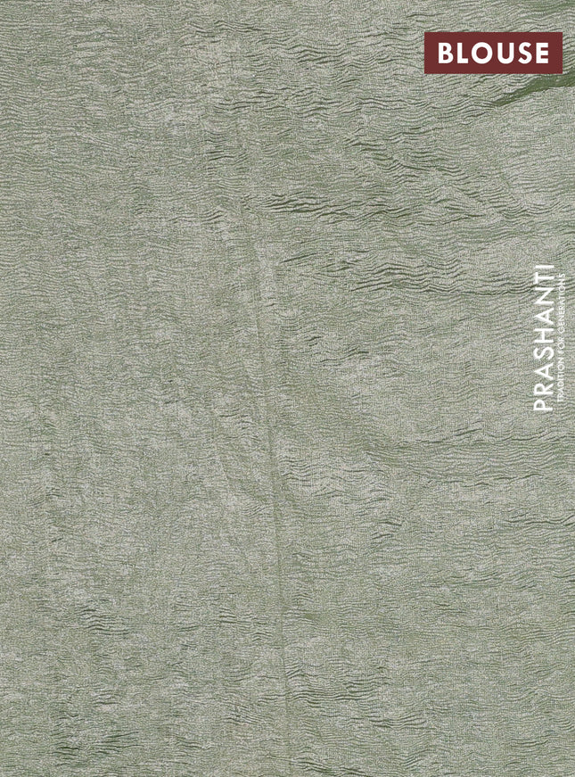 Munga silk saree pastel blue with allover zari woven stripes pattern in borderless style