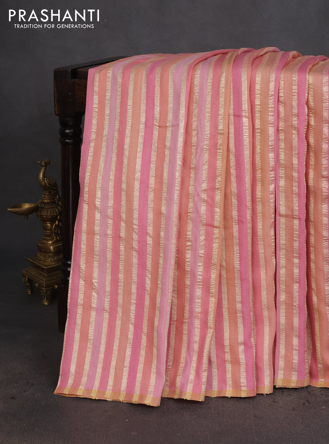 Munga silk saree pastel pink with allover zari woven stripes pattern in borderless style