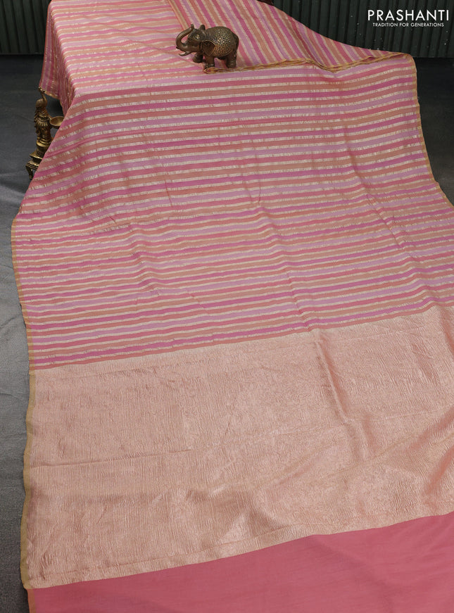 Munga silk saree pastel pink with allover zari woven stripes pattern in borderless style