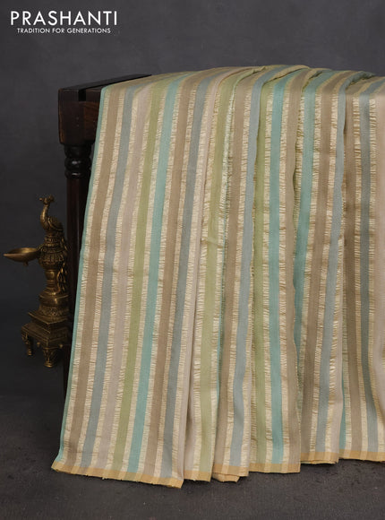 Munga silk saree multi colour with allover zari woven stripes pattern in borderless style