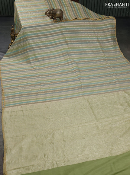 Munga silk saree multi colour with allover zari woven stripes pattern in borderless style