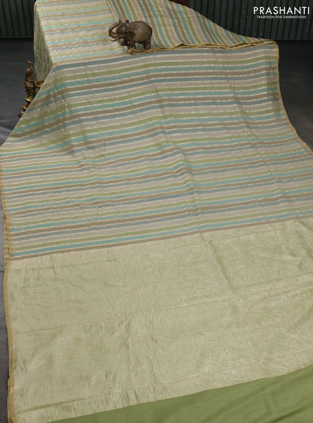 Munga silk saree multi colour with allover zari woven stripes pattern in borderless style