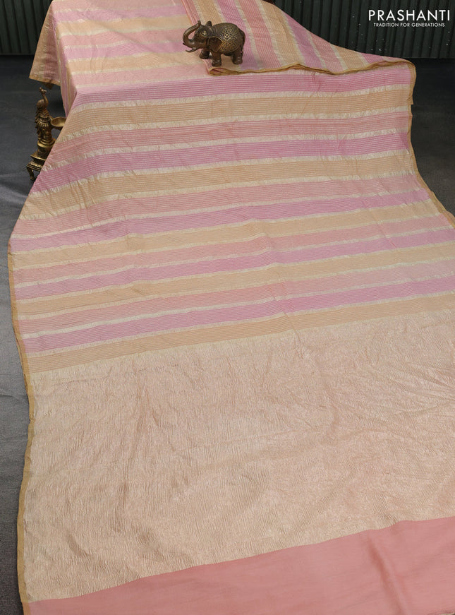 Munga silk saree pastel pink and sandal with allover zari woven stripes pattern in borderless style