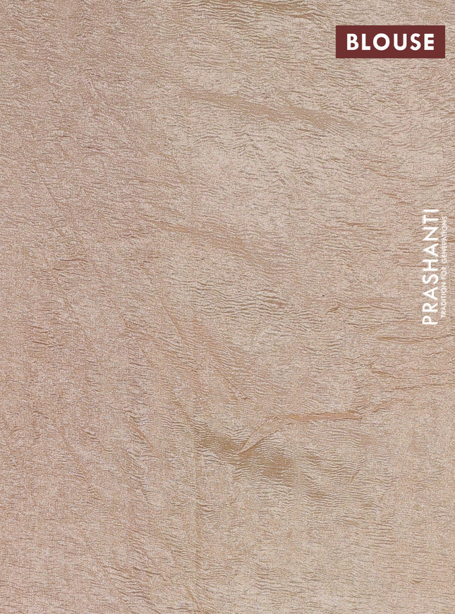 Munga silk saree pastel pink and sandal with allover zari woven stripes pattern in borderless style