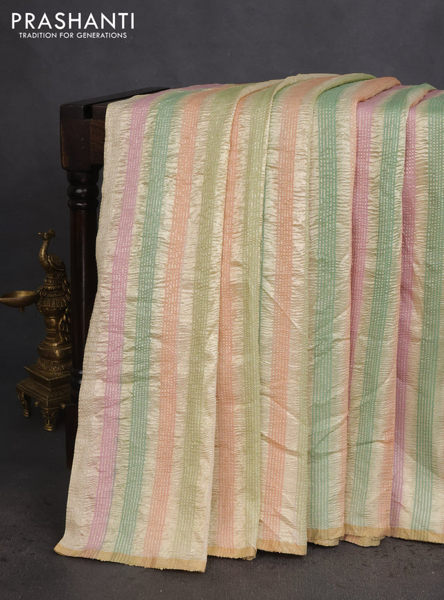 Munga silk saree multi colour with allover zari woven stripes pattern in borderless style