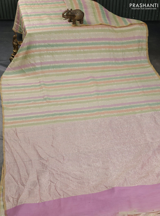 Munga silk saree multi colour with allover zari woven stripes pattern in borderless style