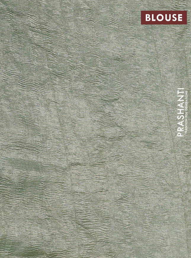 Munga silk saree green shade with allover zari woven stripes pattern in borderless style