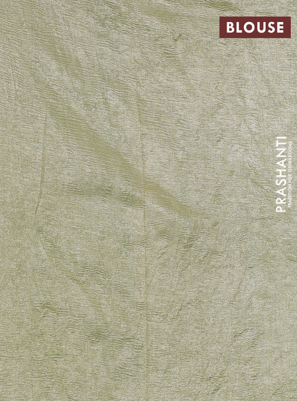 Munga silk saree pastel green and pastel blue with allover zari woven stripes pattern in borderless style