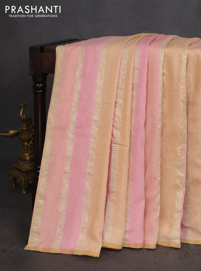 Munga silk saree pastel pink and sandal with allover zari woven stripes pattern in borderless style
