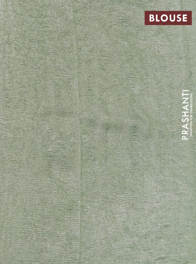 Munga silk saree pastel green and pastel blue with allover zari woven stripes pattern in borderless style