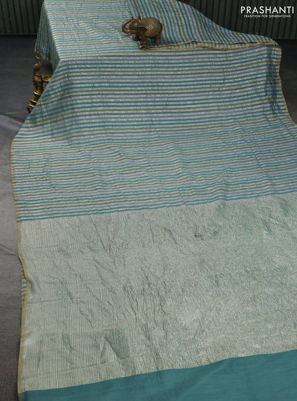 Munga silk saree teal blue with allover zari woven stripes pattern in borderless style