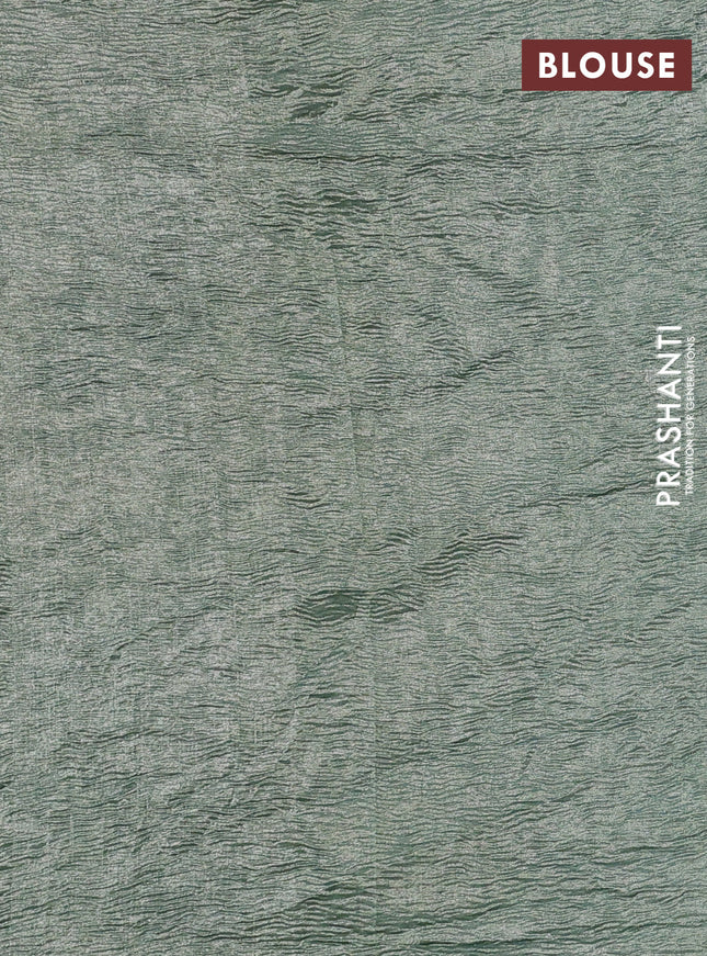 Munga silk saree teal blue with allover zari woven stripes pattern in borderless style