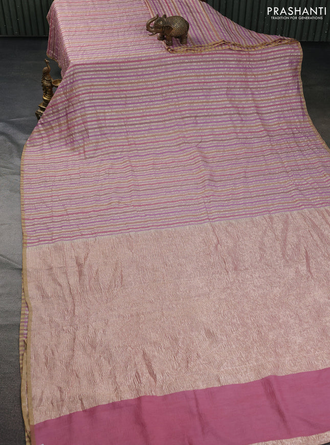 Munga silk saree pastel pink with allover zari woven stripes pattern in borderless style