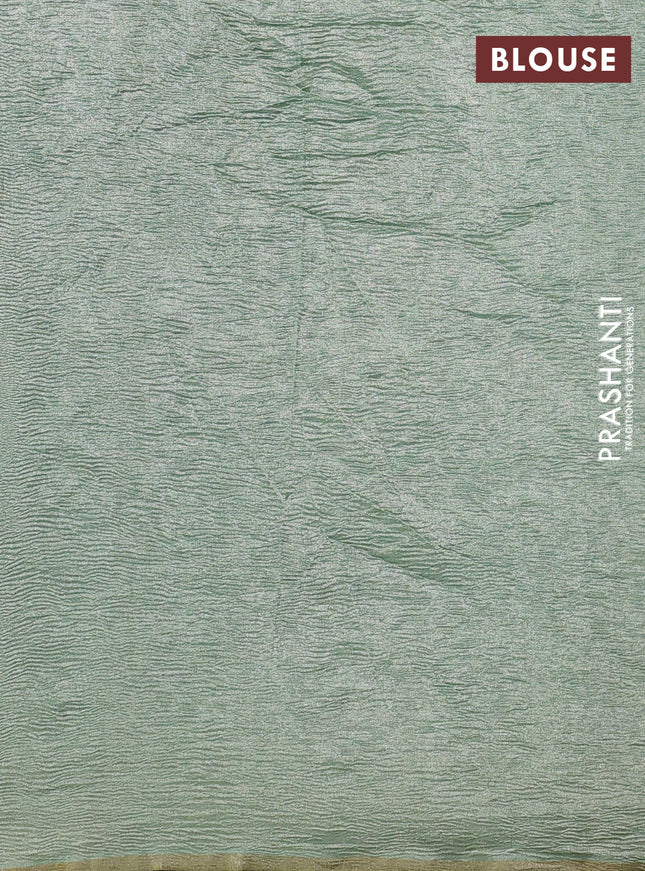 Munga silk saree pastel green with allover zari woven stripes pattern in borderless style