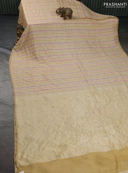 Munga silk saree sandal with allover zari woven stripes pattern in borderless style