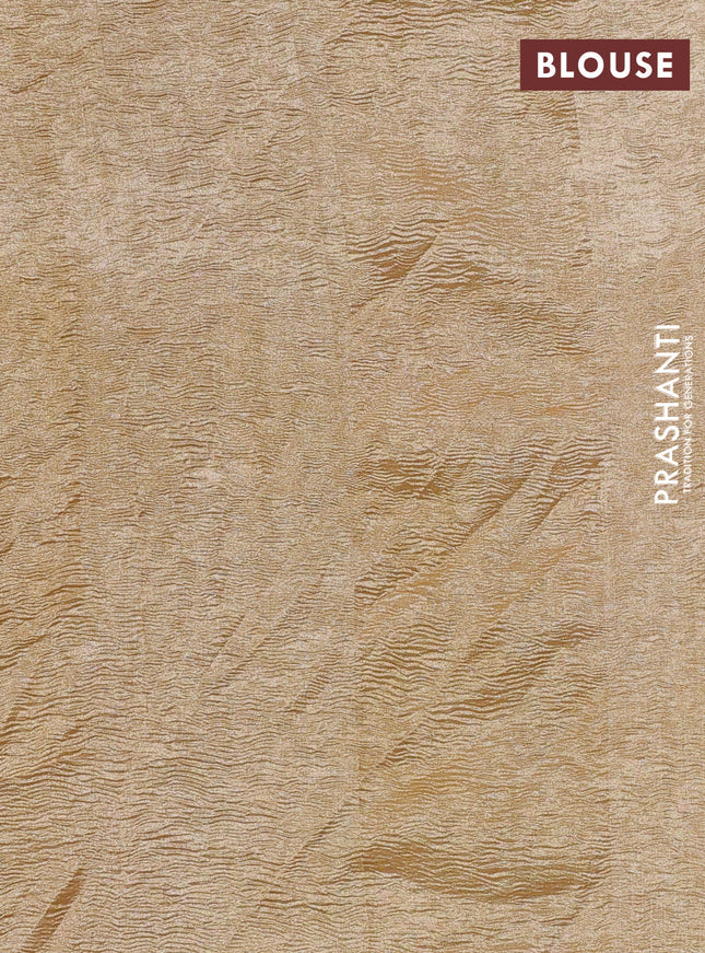 Munga silk saree pale yellow and pale orange with allover zari woven stripes pattern in borderless style