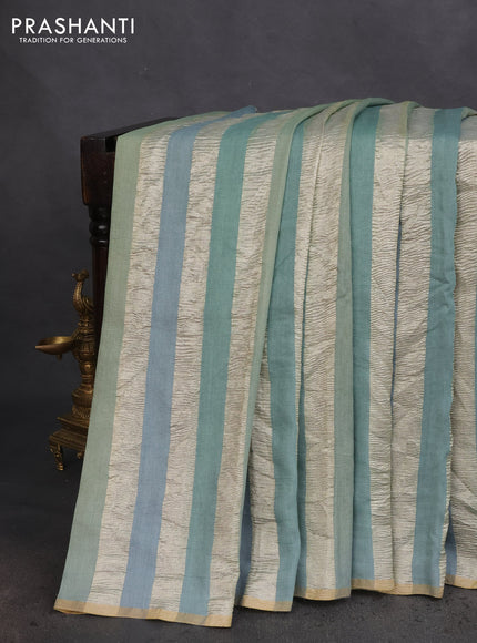 Munga silk saree pastel grey with allover zari woven stripes pattern in borderless style