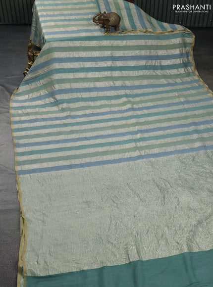 Munga silk saree pastel grey with allover zari woven stripes pattern in borderless style