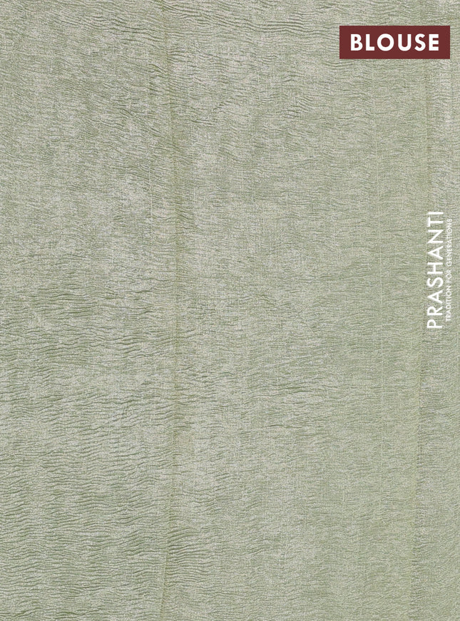 Munga silk saree pastel green and pastel blue with allover zari woven stripes pattern in borderless style