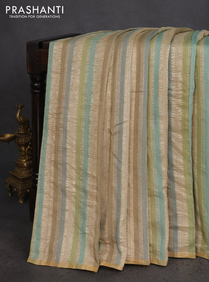 Munga silk saree multi colour with allover zari woven stripes pattern in borderless style