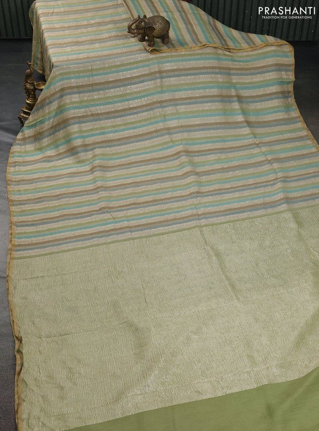 Munga silk saree multi colour with allover zari woven stripes pattern in borderless style