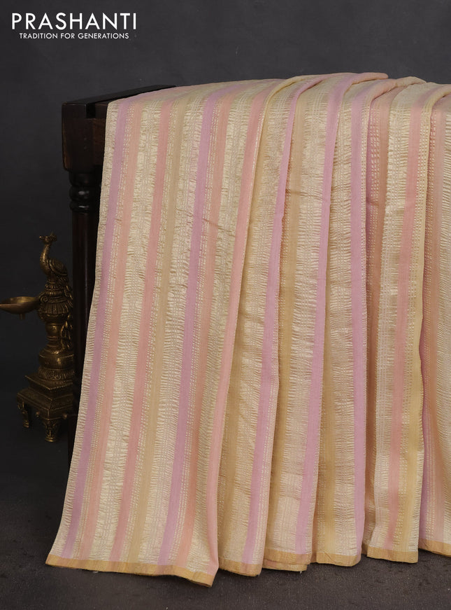 Munga silk saree multi colour with allover zari woven stripes pattern in borderless style