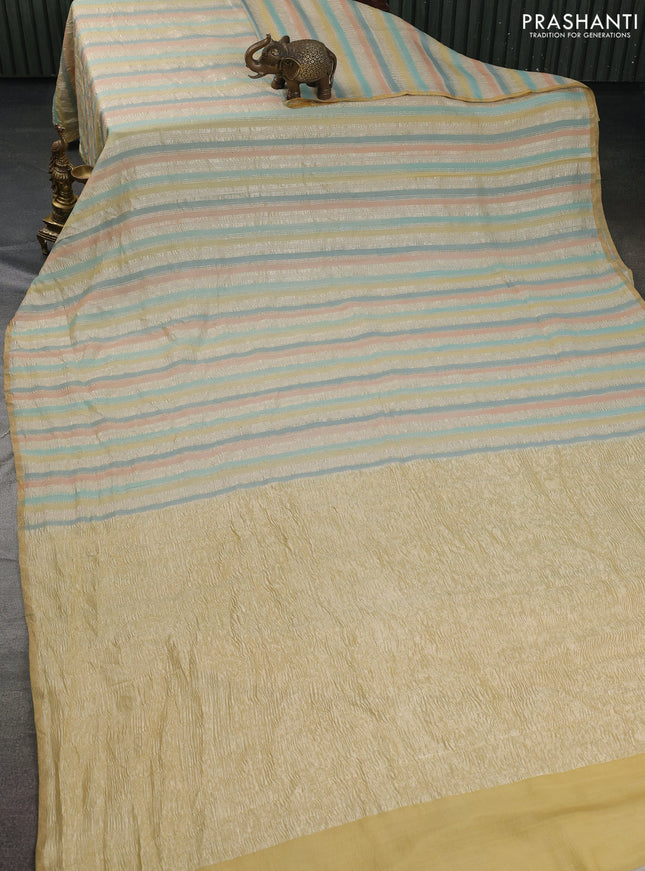 Munga silk saree multi colour with allover zari woven stripes pattern in borderless style